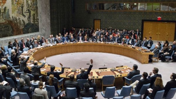In this image released by the UN, members of the Security Council vote on December 23, 2016, on a resolution to stop Israeli settlements. (AFP/Manuel Elias)