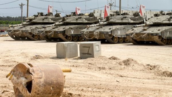 Palestinians who work near the “buffer zone” often come under fire from military forces. (AFP/File) 