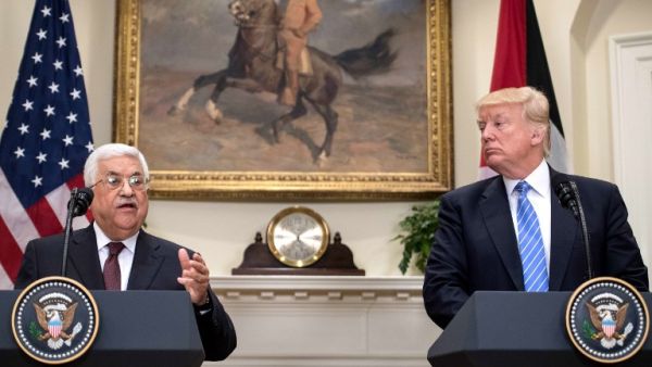 US President Donald Trump and Palestinian Authority President Mahmoud Abbas speak in the Roosevelt Room during a joint statement at the White House in Washington, DC, on May 3, 2017. 