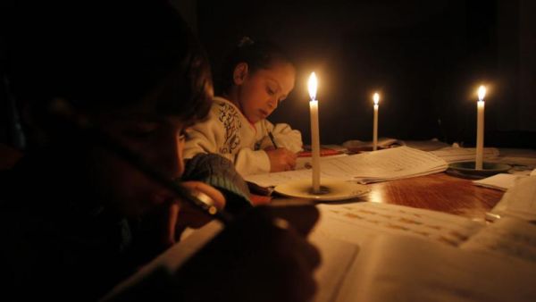 Energy authorities are desperately cash-strapped, in part because of unpaid bills.  (AFP/Mohammed Abed)