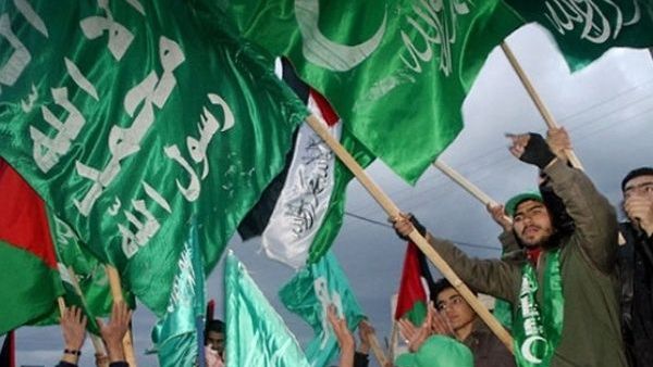 Hamas supporters wave flags during a rally in Gaza. (AFP/ File Photo)