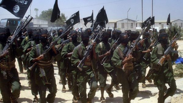 Al-Shabaab militants perform military drills at a village in Lower Shabelle region, some 25 kilometres outside Mogadishu on February 17, 2011. (AFP/Mustafa Abdi)