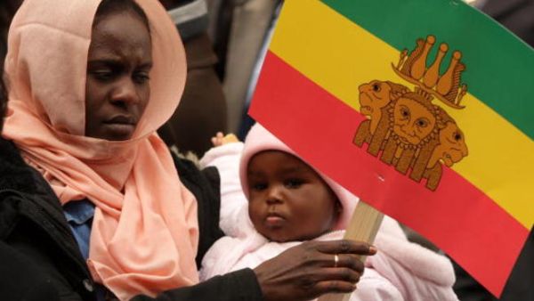 LONDON, ENGLAND - MARCH 04: Protesters campaigning for the indictment of Sudan&#039;s president Omar al-Bashir demonstrate outside the Sudanese embassy on March 4, 2009 in London