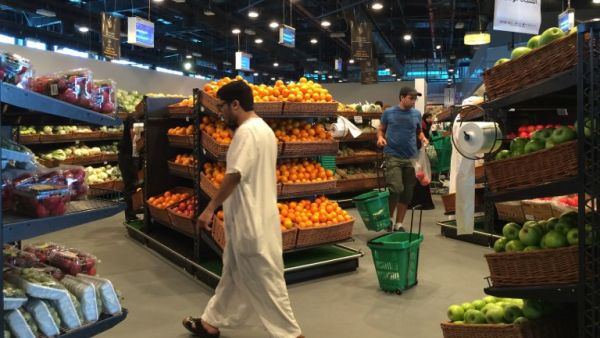 Shoppers look to fill their "Qatari stomachs" in a Doha supermarket (file photo)