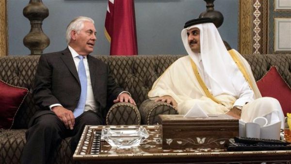 US Secretary of State Rex Tillerson (L) speaks with Qatar's Emir Sheikh Tamim bin Hamad Al-Thani in Doha on Tuesday, July 11, 2017. (AFP)