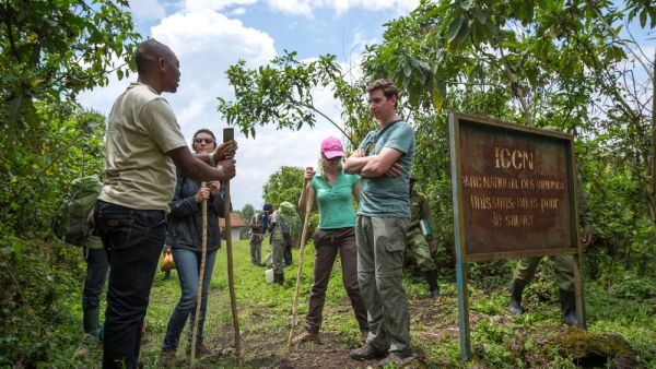 A group of tourist, rangers and carriers inside the tropical jungle (Shutterstock/File Photo)