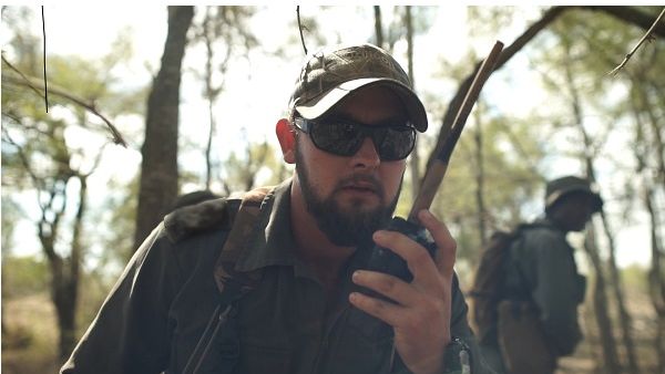 Rangers communicate on mobile devices deep in the bush. Rangers communicate on mobile devices deep in the bush.