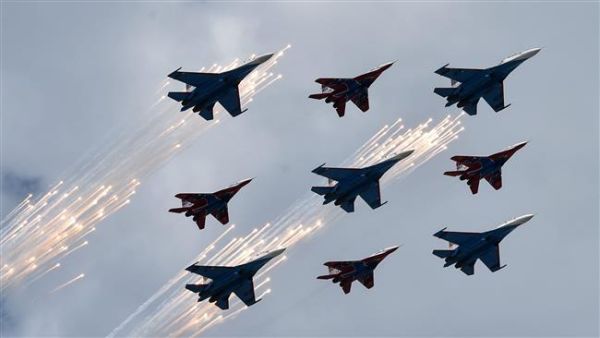 Russian Su-27 jet fighters and MIG 29 jet fighters fly above the Red Square. (AFP/ File)