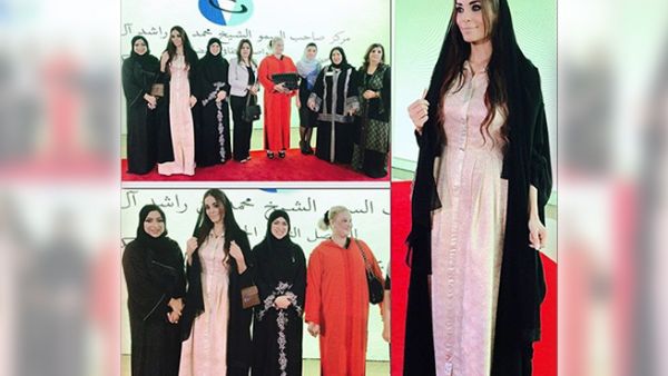 Dominique dressed modestly at the Quran event in the UAE. (Image: Facebook)