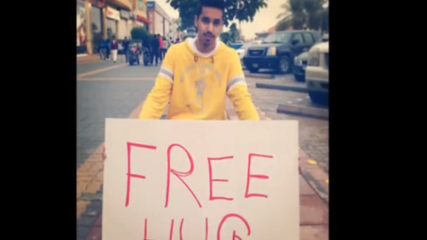 A snapshot of the "Free Hugs" campaign taking over the Riyadh streets. (Via YouTube)