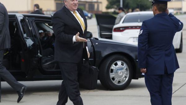US Secretary of State Mike Pompeo heads to his plane to depart for meetings with Crown Prince Mohammed bin Salman in Saudi Arabia from Joint Base Andrews, Maryland on October 15, 2018. (LEAH MILLIS / POOL / AFP)
