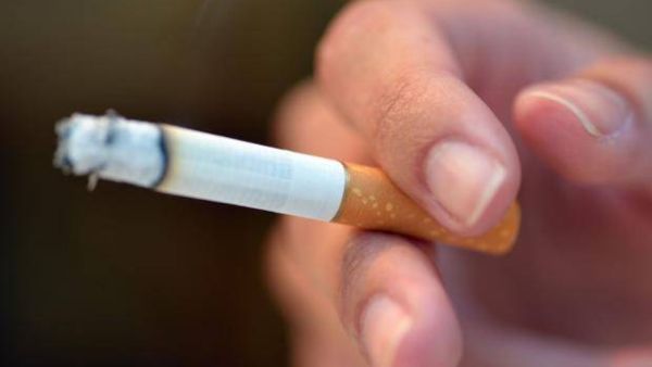 A man has been arrested after appearing in a video apparently forcing a child to smoke. (AFP/ File Photo)
