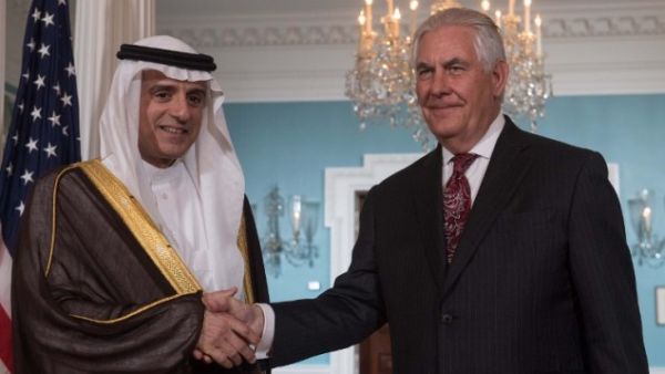 US Secretary of State Rex Tillerson (R) and Saudi Foreign Minister Adel al-Jubeir shake hands prior to talks at the State Department on May 2, 2017. (AFP/Nicholas Kamm)
