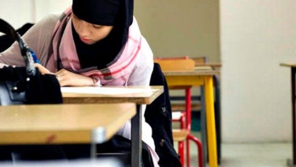 Wearing a hijab “could be interpreted as sexualization” of school children, said the chief inspector of schools (AFP/File) 