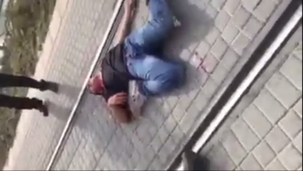 The clip was reportedly shot moments after Israeli police shot down two Palestinian boys they say were responsible for a stabbing attack Monday in a Jewish settlement near East Jerusalem. (Facebook)