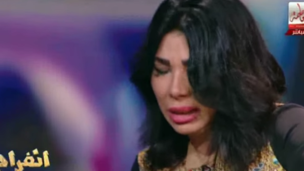Ghada Ibrahim collapses live on air after desperately trying to defend herself against prostitution allegations. (YouTube)