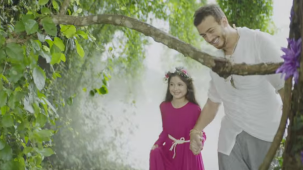 Saad and Munni in a still from the ad. (YouTube)