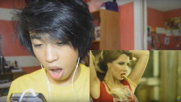 Sammy reacting to Nancy Ajram's music video "Ma Tegi Hena." (YouTube)