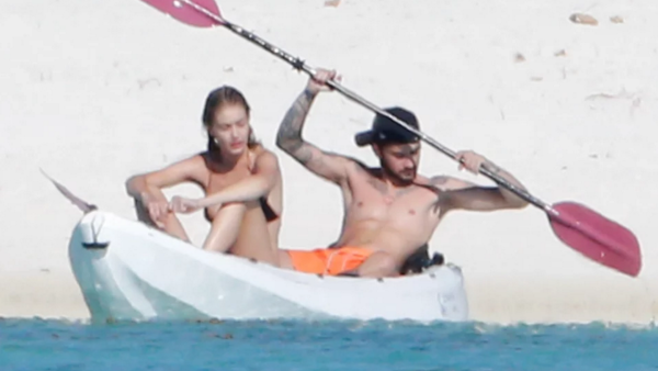 Gigi and Zayn are enjoying a romantic break in Tahiti and have been spotted kayaking and taking a stroll on the beach. (Pop Sugar)