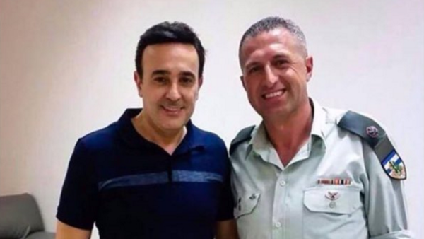 Saber Rebai with the 'Israeli soldier." (File photo)
