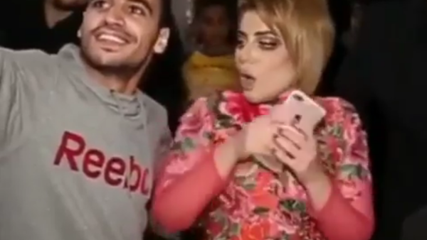 Halima seconds before she pushed away a 'fan' who sexually harassed her. (Instagram)