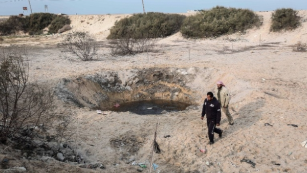 The site of an Israeli air strike targeting a Hamas base in Khan Yunis in the Gaza Strip in December 2017 (AFP/file photo)