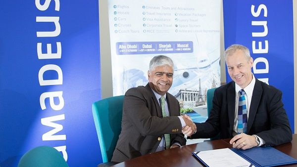 V. Jayaram, Managing Director, Sharaf Travel and Graham Nichols, Managing Director, Amadeus Gulf During the signing. 