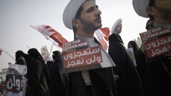 Bahraini protesters march during a demonstration against the arrest of Sheikh Ali Salman. The government has a long history of imprisoning opposition leaders and Shia clerics. (AFP/File) 