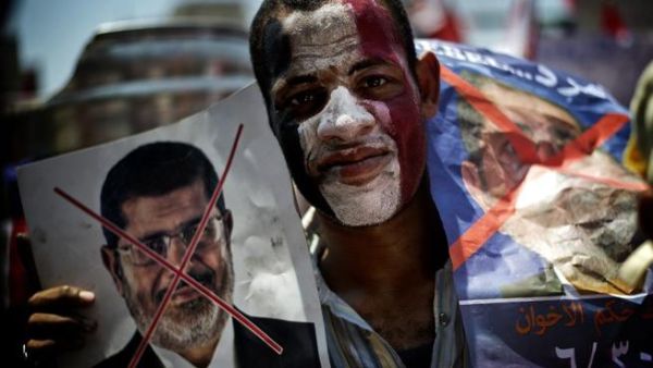 Protester calls for the ouster of Egyptian President Mohamed Morsi in Cairo on June 30 (AFP)