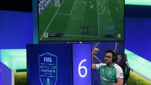 Player Mossad Aldossary competes in the group stages of the FIFA eWorld Cup Grand Final, at the O2 in London on August 2, 2018. The FIFA eWorld Cup Grand Final 2018 will see 32 finalists battle it out for the main prize – the title of FIFA eWorld Cup champion, and pocket USD 250,000 in prize money.
Daniel LEAL-OLIVAS / AFP