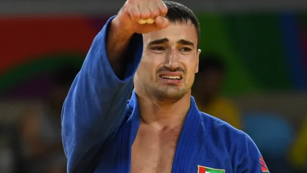 United Arab Emirates's Sergiu Toma celebrates after defeating Italy's Matteo Marconcini during their men's -81kg judo contest bronze medal A match of the Rio 2016 Olympic Games in Rio de Janeiro on August 9, 2016.
Toshifumi KITAMURA / AFP