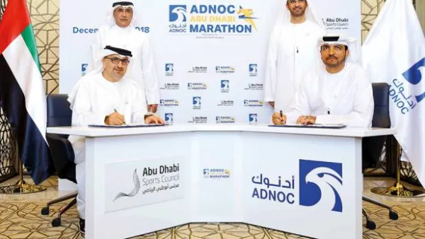 Major General Mohammad Khalfan Al Romaithi, Chairman of General Authority for Sports, Aref Hamad Al Awani, Secretary General of the Abu Dhabi Sports Council, Omar Suwaina Al Suwaidi, Executive Office Director at ADNOC and Sultan Bin Ahmad Al Jaber during the partnership signing ceremony for the ADNOC Abu Dhabi Marathon.