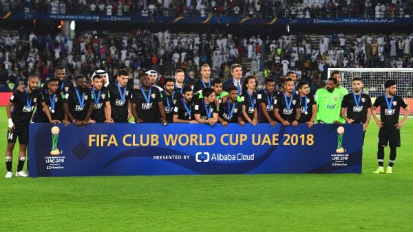 Runner up Abu Dhabi's Al Ain players look at the trophy ceremony after losing the FIFA Club World Cup final football match Spain's Real Madrid vs Abu Dhabi's Al Ain at the Zayed Sports City Stadium in Abu Dhabi, the capital of the United Arab Emirates, on December 22, 2018.
Giuseppe CACACE / AFP