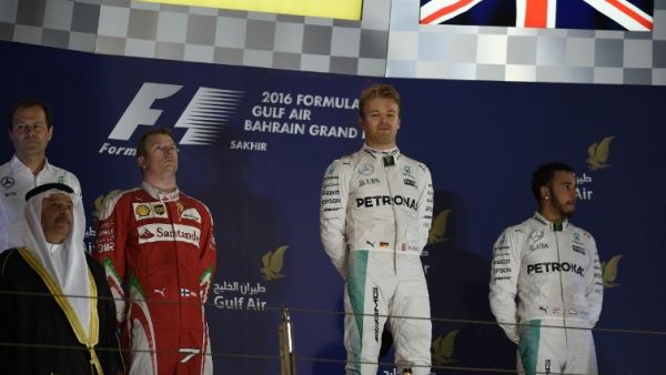 Mercedes AMG Petronas F1 Team's German driver Nico Rosberg (2nd R) celebrates on the podium after winning the Bahrain Formula One Grand Prix next to second placed Ferrari's Finnish driver Kimi Raikkonen (3rd L) and third placed Mercedes AMG Petronas F1 Team's British driver Lewis Hamilton (R) at the Sakhir circuit in Manama on April 3, 2016. AFP PHOTO / MOHAMMED AL-SHAIKH
MOHAMMED AL-SHAIKH / AFP