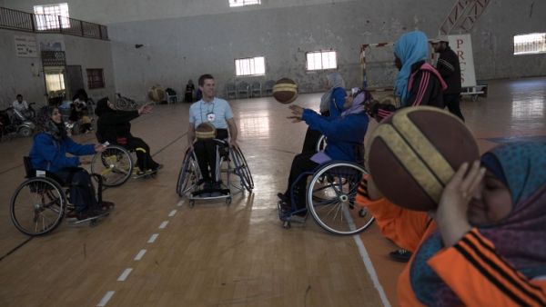 US coach Jess Markt (C-L) leads a class during a wheelchair basketball coaching session for Palestinian women in Khan Younis in the southern Gaza strip on May 28, 2016. More than 75,000 Gazans out of a population of 1.9 million are physically or visually disabled, according to the ICRC. Of those, a third were wounded by war. Paralympic teams are being slowly created, and the ICRC has provided 70 wheelchairs to eight teams this year.
SAID KHATIB / AFP