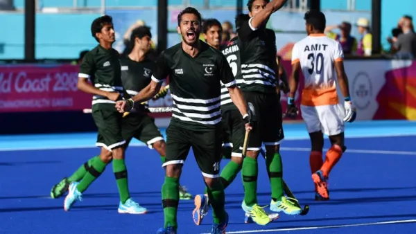 Pakistan players celebrate their 2-2 draw against India after their men's field hockey match between India and Pakistan at the 2018 Gold Coast Commonwealth Games on the Gold Coast on April 7, 2018.
Anthony WALLACE / AFP