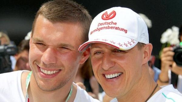 Podolski and Schumacher (picture courtesy of dailymail.co.uk)