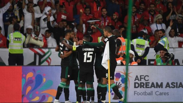 UAE's players celebrate their third goal during the 2019 AFC Asian Cup Round of 16 football match between UAE and Kyrgyzstan at the Zayed Sports City Stadium in Abu Dhabi on January 21, 2019.
Khaled DESOUKI / AFP