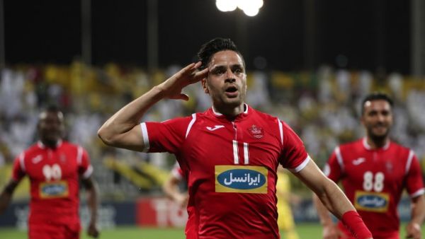 Kamal Kamyabinia celebrates after scoring