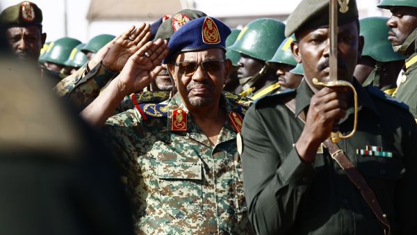 Sudanese President Omar al-Bashir salutes during the joint Sudan and Saudi Arabia airforce drill near Khartoum. (AFP) 