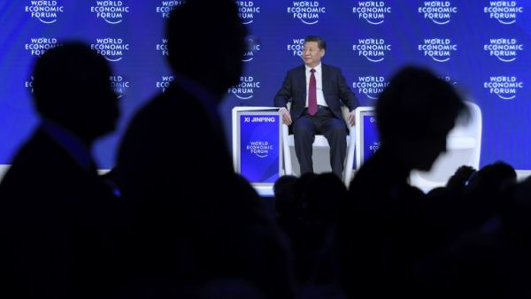 China's President Xi Jinping delivered a speech during the first day of the World Economic Forum, on January 17, 2017 in Davos.  (AFP/Fabrice Coffrini)