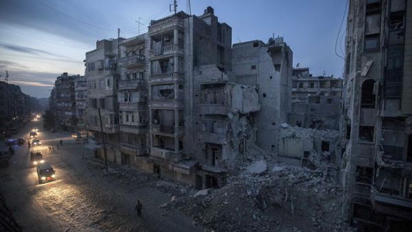 Syrian street during one of many power outages caused by war torn infrastructure failures. [washingtonpost]