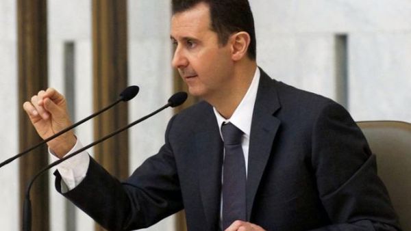 A handout picture released by the Syrian Arab News Agency (SANA) shows Syria's President Bashar al-Assad heading the plenary meeting of the central committee of the ruling al-Baath party (AFP/ SANA)
