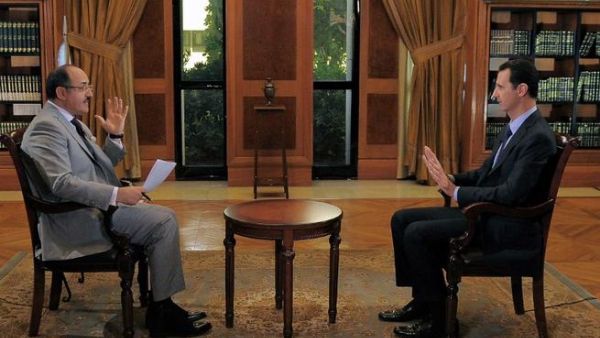 Assad gives interview on upcoming meetings and possibility for re-election. [AFP]