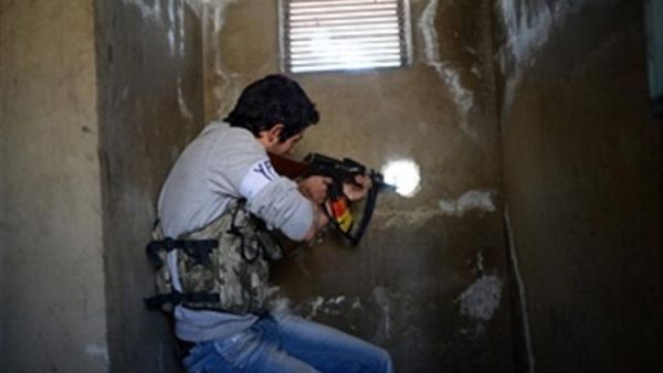 A Kurdish fighter the northern Syrian city of Aleppo on April 14, 2013. (DIMITAR DILKOFF/AFP/Getty Images)