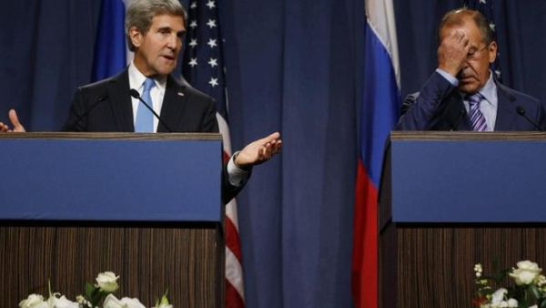 US Secretary of State John Kerry (L) and Russian Foreign minister Sergei Lavrov give a joint press conference in Geneva following their meeting on Syria's chemical weapons, on September 12, 2013. [AFP]