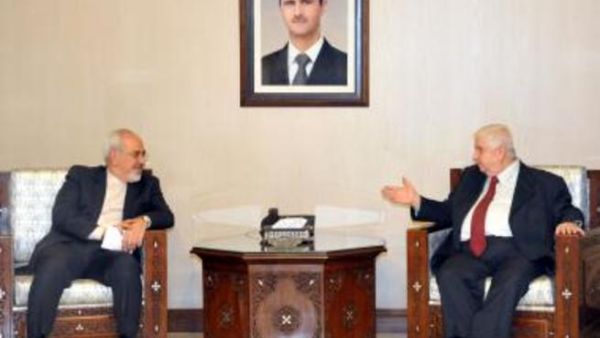 وزيرا الخارجية الايراني محمد جواد ظريف والسوري وليد المعلم