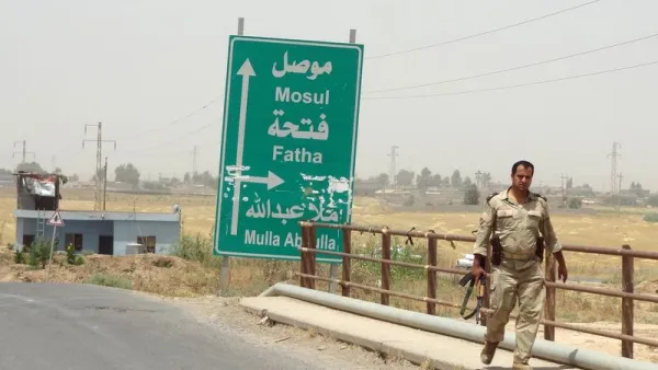An Iraqi soldier travels away from Mosul after Daesh's takeover of the city in June 2014.  (AFP/Marwan Ibrahim)