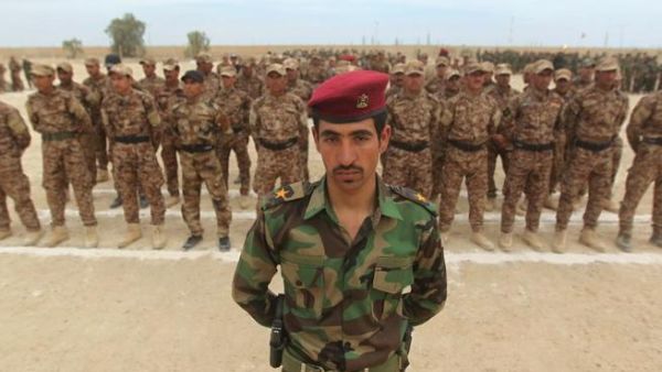 Sunni volunteers in the mainly Shiite Popular Mobilization forces take part in training exercises on May 8, 2015.  (AFP/Ahmad al-Rubaye)