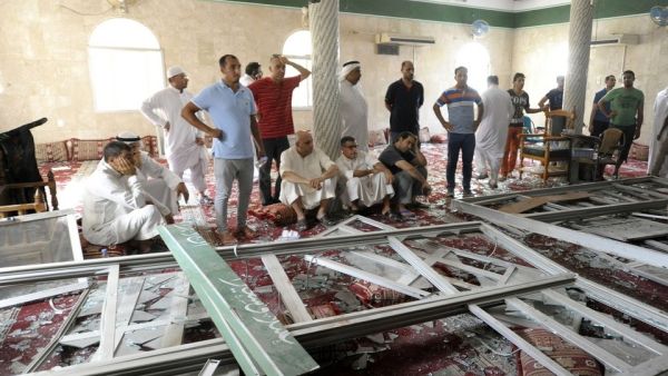 Locals examine the damage to Imam Ali mosque in Qatif, Saudi Arabia following a Friday suicide bomb attack that left at least 15 dead.  (AFP/File) Locals examine the damage to Imam Ali mosque in Qatif, Saudi Arabia following a Friday suicide bomb attack that left at least 15 dead.  (AFP/File)